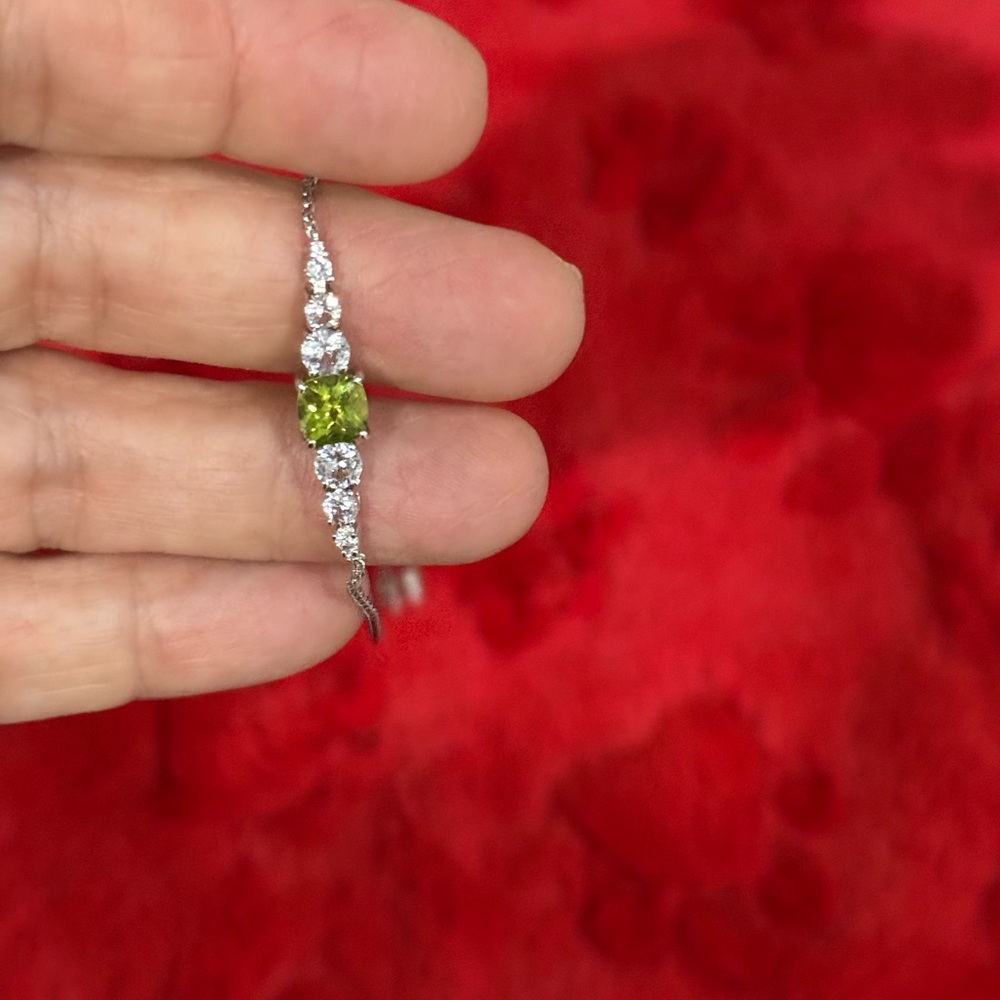 Sterling Silver peridot bolo bracelet with white sapphires. - Picture 4 of 9